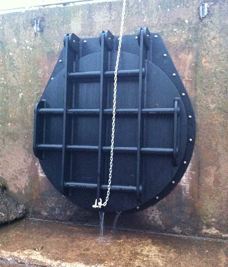 Water control flap valve close up for controlling river water levels to prevent flooding